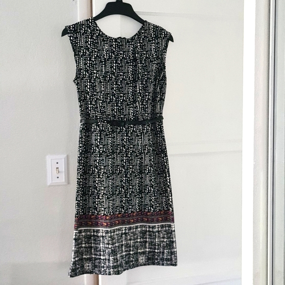 Size 6 black ⚫️ & white ⚪️ dress with multicolored trim midway down. - Picture 1 of 4